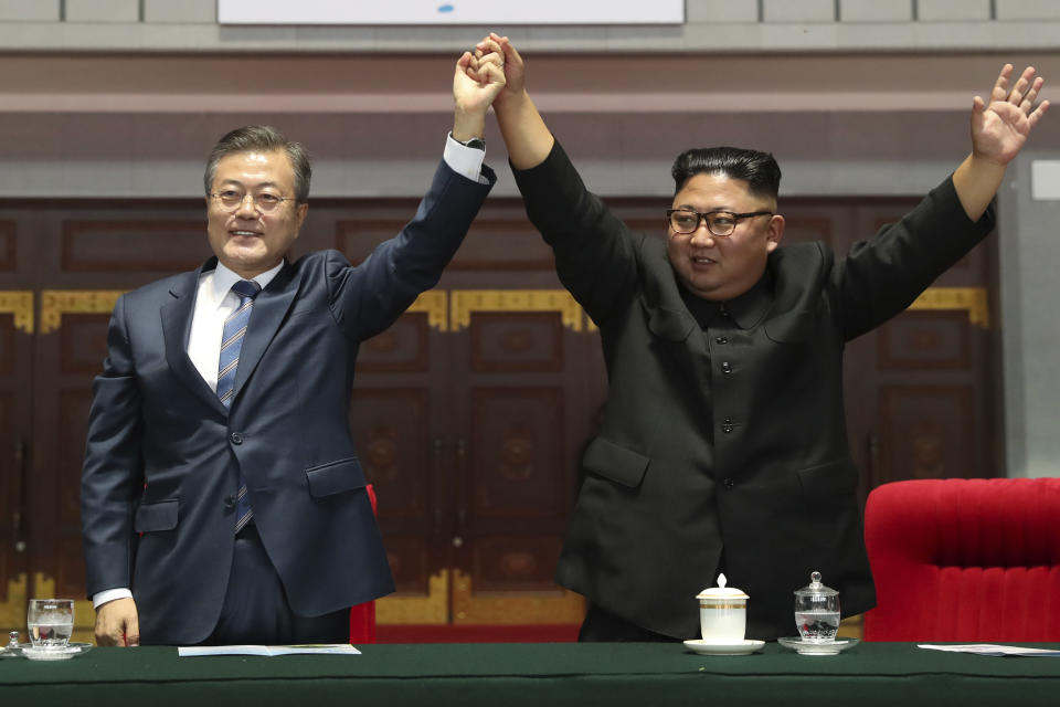 In this Wednesday, Sept. 19, 2018, file photo, South Korean President Moon Jae-in and North Korean leader Kim Jong Un greet to Pyongyang citizens after watching the mass games performance of "The Glorious Country" at May Day Stadium in Pyongyang, North Korea. (Pyongyang Press Corps Pool via AP)