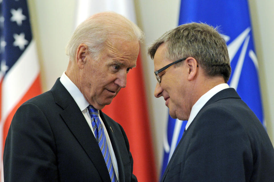 U.S. Vice President Joe Biden, left, and Polish President Bronislaw Komorowski look at each others after a press conference following their talks in Warsaw, Poland, Tuesday, March 18, 2014. Biden arrived in Warsaw for consultations with Prime Minister Donald Tusk and President Bronislaw Komorowski, a few hours after Russian President Vladimir Putin approved a draft bill for the annexation of Crimea, one of a flurry of steps to formally take over the Black Sea peninsula. (AP Photo/Alik Keplicz)