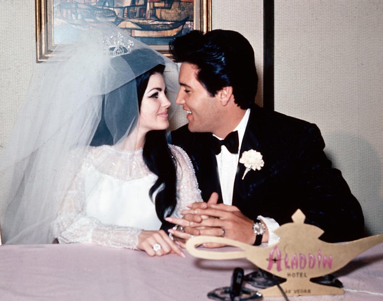 Priscilla and Elvis Presley at the Aladdin Hotel in Las Vegas after their wedding on May 1, 1967.
