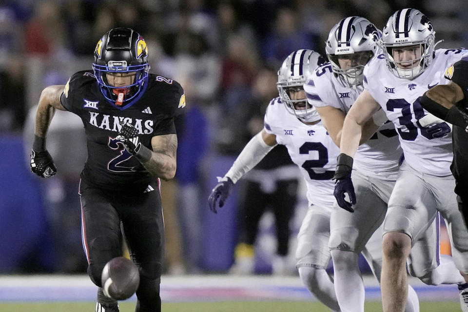 Kansas wide receiver Lawrence Arnold (2) chases a fumble during the first half of an NCAA college football game against Kansas State Saturday, Nov. 18, 2023, in Lawrence, Kan. (AP Photo/Charlie Riedel)