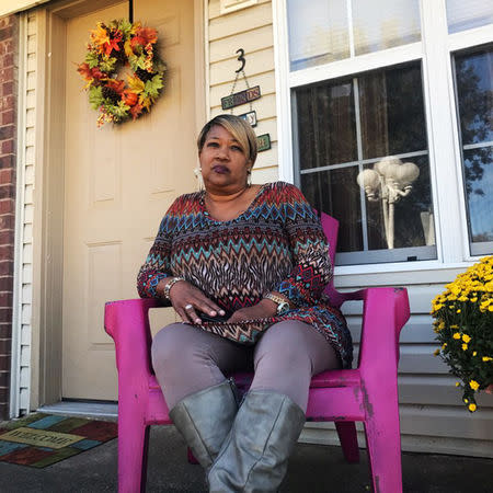 Veda Carter, mother of Corey Carter, sits on the porch of her home in Valliant, Oklahoma, U.S. October 25, 2017. Picture taken October 25, 2017. REUTERS/Charles Levinson