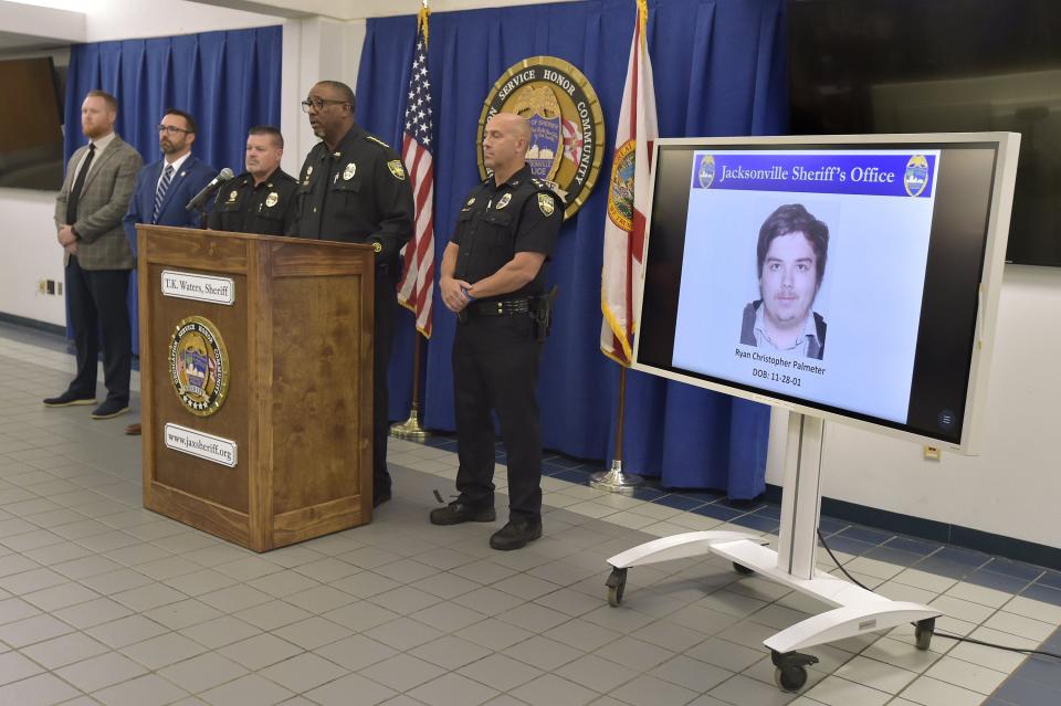 A photograph of shooter Ryan Palmeter is shown on a video monitor during Sheriff T.K. Waters' news conference following the Dollar General shooting.