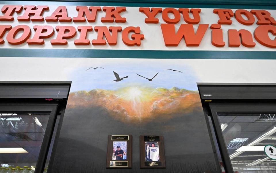 Scott Bolter, better known as Scott In Meat, has generated a following on social media for the chalk art he creates at WinCo Foods in Clovis where he works in the meat department. Pictured is a permanent piece he painted memorializing store employees who have passed away.