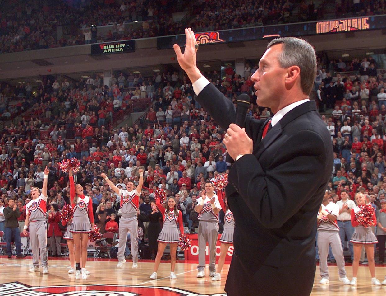 Addressing the crowd at the Ohio State-Michigan basketball game the night he was hired, Jim Tressel promised that fans would be proud of his football team "most especially, in 310 days in Ann Arbor, Mich."