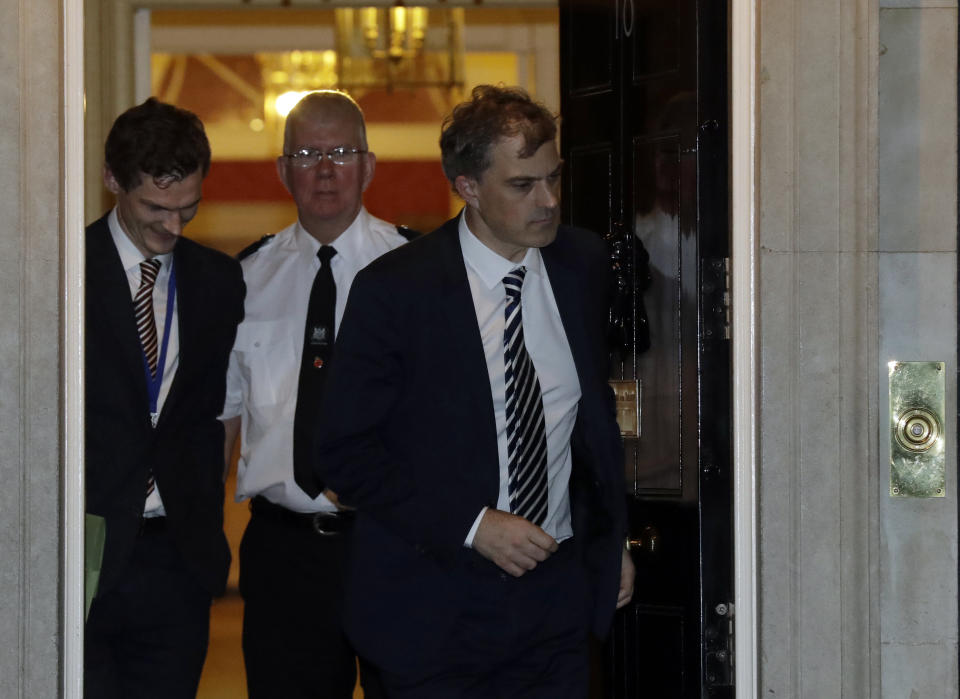 Chief Whip Julian Smith leaves after a cabinet meeting at 10 Downing Street in London, Wednesday, Nov. 14, 2018. British Prime Minister Theresa May says Cabinet agrees draft Brexit deal with European Union after 'impassioned' debate. (AP Photo/Matt Dunham)