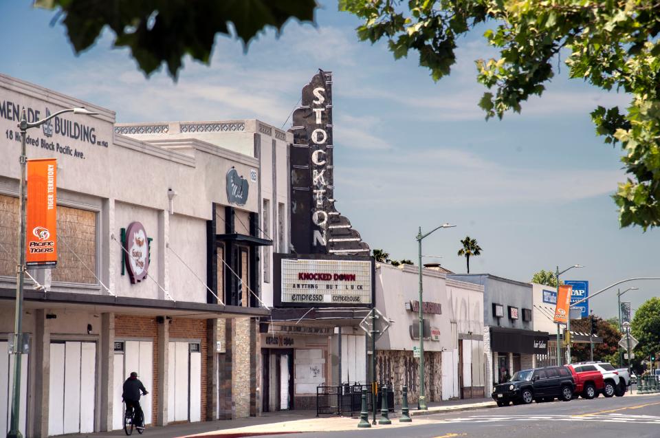 The facade of the Empire Theatre remains standing in the 1800 block of Pacific Avenue along the Miracle Mile in Stockton on Jun. 27, 2023. In 2017, nine businesses in the theater complex by city officials after a long-running dispute with the then property owner Christopher "Kit" Bennitt over fire safety and unpermitted construction work. In 2018, a two-alarm fire burned the theater lobby and auditorium and adjacent spaces. In 2021, a nice-alarm fire heavily damaged the theater again.