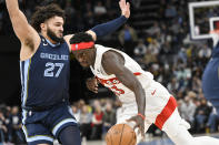 Toronto Raptors forward Pascal Siakam (43) drives against Memphis Grizzlies forward David Roddy (27) in the first half of an NBA basketball game Sunday, Feb. 5, 2023, in Memphis, Tenn. (AP Photo/Brandon Dill)