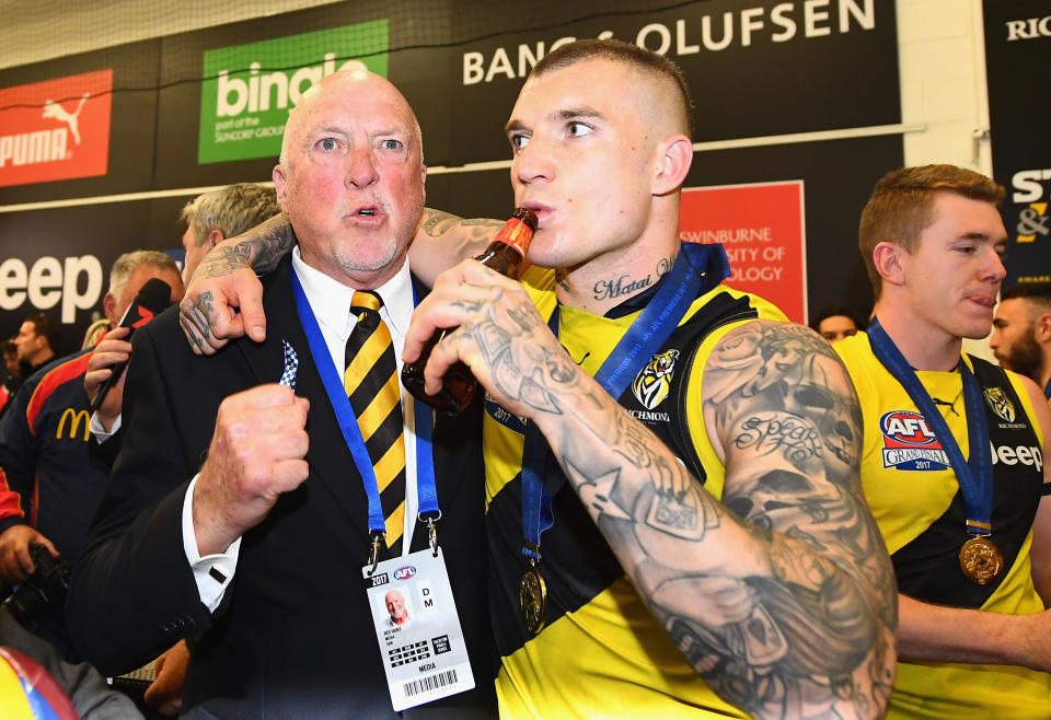 Rex Hunt, pictured here with Dustin Martin after the AFL grand final in 2017.