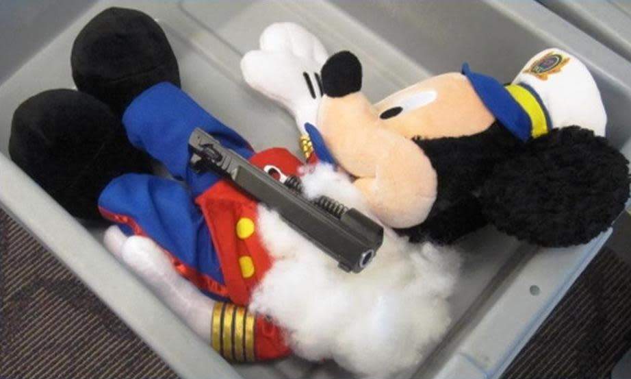 This undated photo provided by the federal Transportation Security Administration shows pistol parts hidden in a stuffed animal found by TSA officials at T.F. Green Airport in Warwick, R.I., Monday May 7, 2012. The TSA said Tuesday that a man traveling to Detroit with his 4-year-old son was stopped when a TSA officer noticed the disassembled gun components "artfully concealed" inside three stuffed animals. The stuffed animals were inside a carry-on bag that was put through an x-ray machine as part of normal security screening. (AP Photo/Transportation Security Administration)
