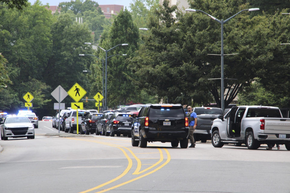 Law enforcement respond to the University of North Carolina at Chapel Hill campus in Chapel Hill, N.C., on Monday, Aug. 28, 2023, after the university locked down and warned of an armed person on campus. (AP Photo/Hannah Schoenbaum)