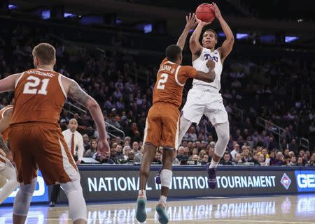 Apr 2, 2019; New York, NY, USA; Texas Christian Horned Frogs guard Desmond Bane (1) shoots the ball against the Texas Longhorns in the first half of the NIT semifinals at Madison Square Garden. Mandatory Credit: Wendell Cruz-USA TODAY Sports