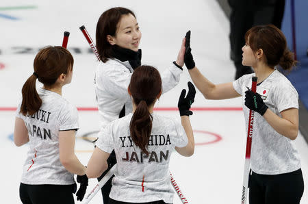 Curling - Pyeongchang 2018 Winter Olympics - Women's Bronze Medal Match - Britain v Japan - Gangneung Curling Center - Gangneung, South Korea - February 24, 2018 - Skip Satsuki Fujisawa of Japan and her teammates react. REUTERS/Cathal McNaughton