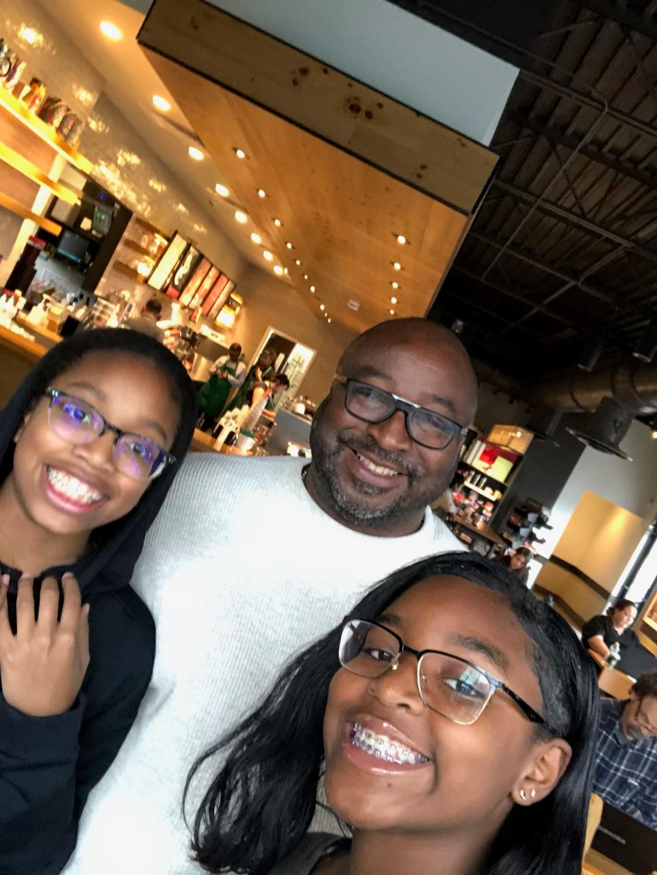 FAMU Faculty Union President Roscoe Hightower and his two daughters, 18-year-old Jane and 20-year-old Asia.