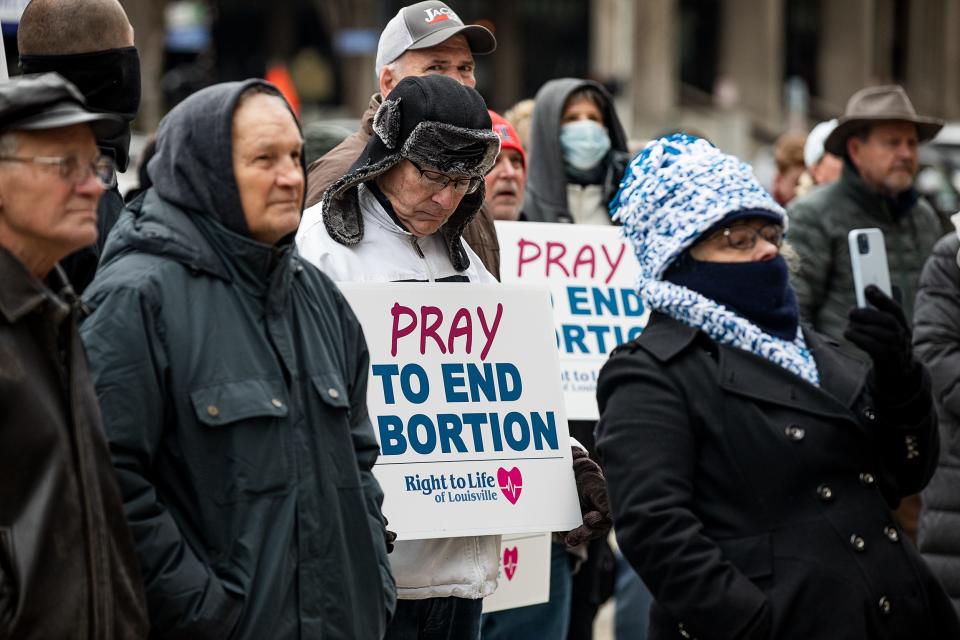 People held up anti-abortion signs during a Right to Life rally at the steps of Louisville Metro Hall. Right to Life of Louisville hosted the rally to commemorate the 49th anniversary of Roe v Wade. January 21, 2022