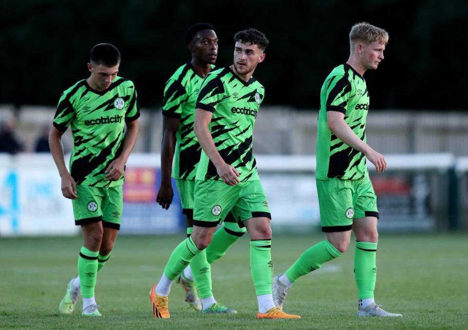 Callum Jones of Forest Green Rovers celebrates after scoring the team's first goal with teammates during the pre-Season friendly match between Melksham Town and Forest Green Rovers at Oakfield Stadium on July 05, 2023 in Melksham, England. Forest Green Rovers caretaker manager Hannah Dingley becomes first woman to take charge of English Football League club. (Photo by Ryan Hiscott/Getty Images)