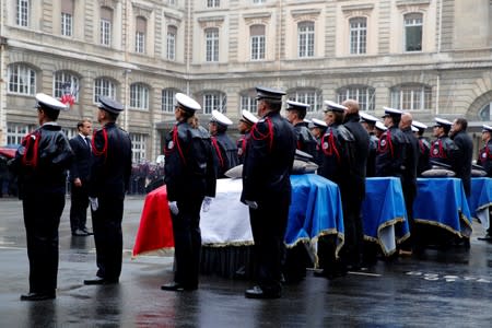 French President Macron leads ceremony for four victims of Paris police attack, in Paris