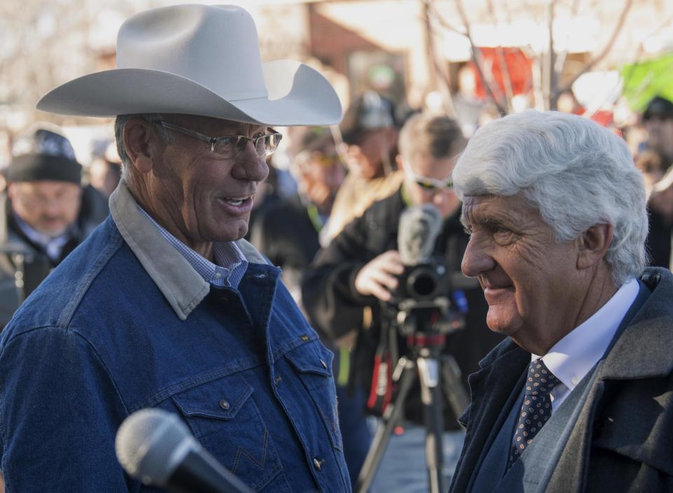 San Juan County Commissioner Bruce Adams talks with Rob Bishop as they hold a press conference in reaction to the new Bears Ears National Monument in Monticello, Utah, Thursday, Dec. 29, 2016. President Barack Obama expanded his environmental legacy in the final days of his presidency with national monument designations on lands in Utah and Nevada that have become flashpoints over use of public land in the U.S. West. (Rick Egan/The Salt Lake Tribune via AP)