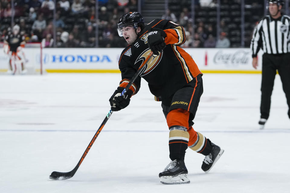 Anaheim Ducks defenseman Jamie Drysdale shoots against the Winnipeg Jets during the first period of an NHL hockey game Friday, Jan. 5, 2024, in Anaheim, Calif. (AP Photo/Ryan Sun)