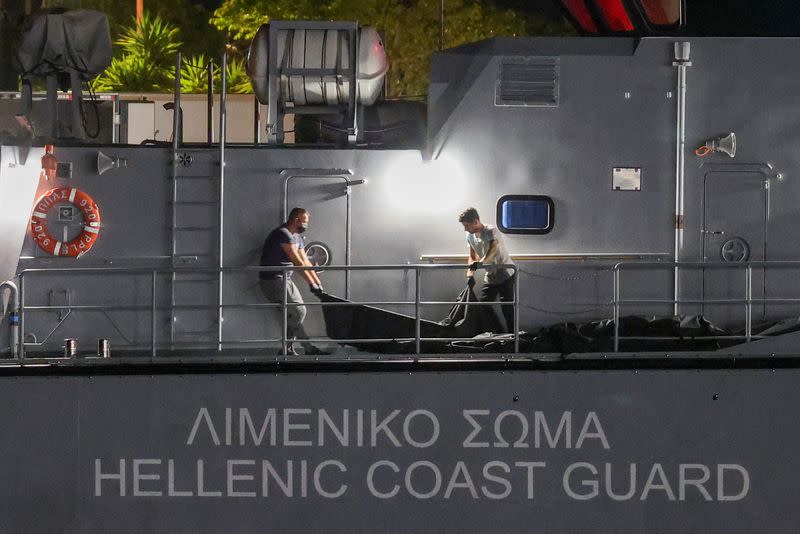 Body bags carrying migrants retrieved from sea arrive in Kalamata