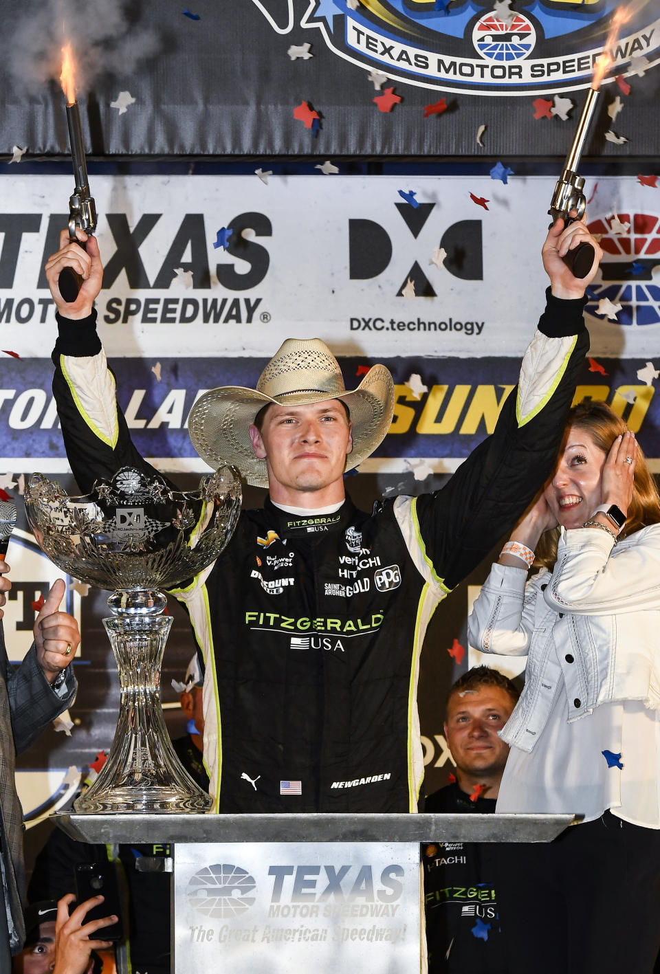 Josef Newgarden celebrates in Victory Lane after winning the IndyCar auto race at Texas Motor Speedway, Saturday, June 8, 2019, in Fort Worth, Texas. (AP Photo/Larry Papke)