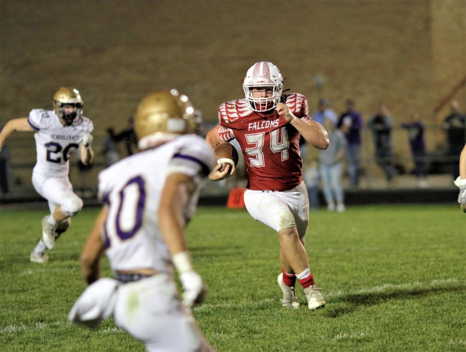 Bennett VandenBerg looks for Schoolcraft defenders to run over on Friday night.