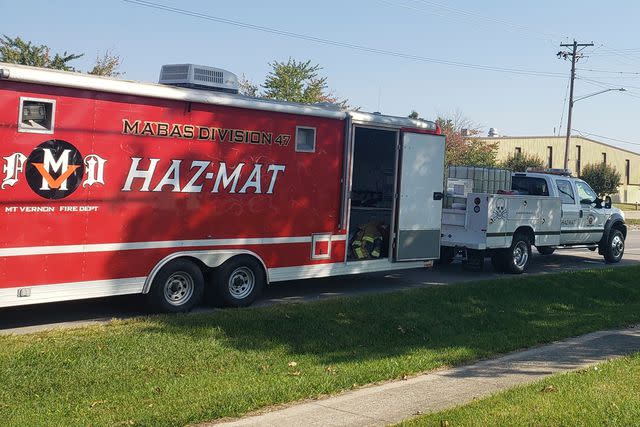 <p>Jeff Long/Effingham Daily News via AP</p> Emergency responders set up a staging area near Teutopolis High School on Saturday, Sept. 30, 2023, in Teutopolis, Ill.