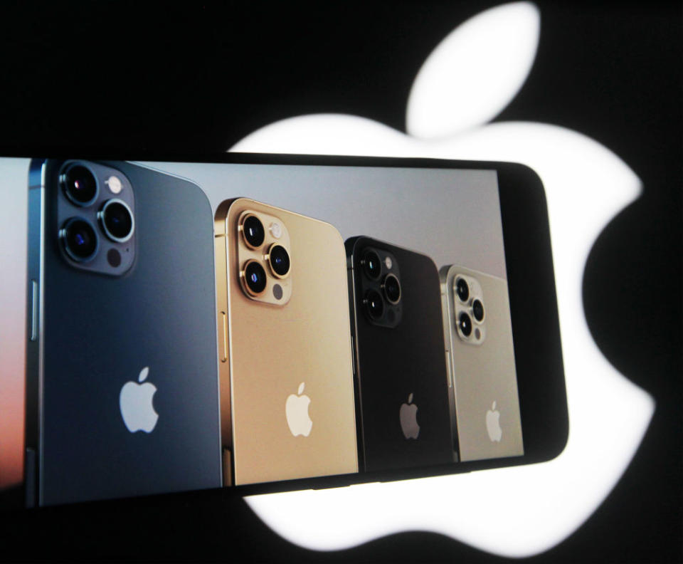 UKRAINE - 2020/10/14: In this photo illustration a screenshot from Apple's launch promotional material of the New iPhone12 Pro seen displayed on a mobile phone screen with an Apple logo in the background. (Photo Illustration by Pavlo Gonchar/SOPA Images/LightRocket via Getty Images)