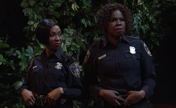 Ego Nwodim and Leslie Jones portrayed Baltimore police officers who pulled over a man to sexually harass him. Nwodim, who hails from the city, wrote the sketch. (Image: <em>Saturday Night Live</em>)