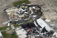 A airplane hanger is destroyed Thursday, Aug. 27, 2020, after Hurricane Laura went through the area near Lake Charles, La. (AP Photo/David J. Phillip)