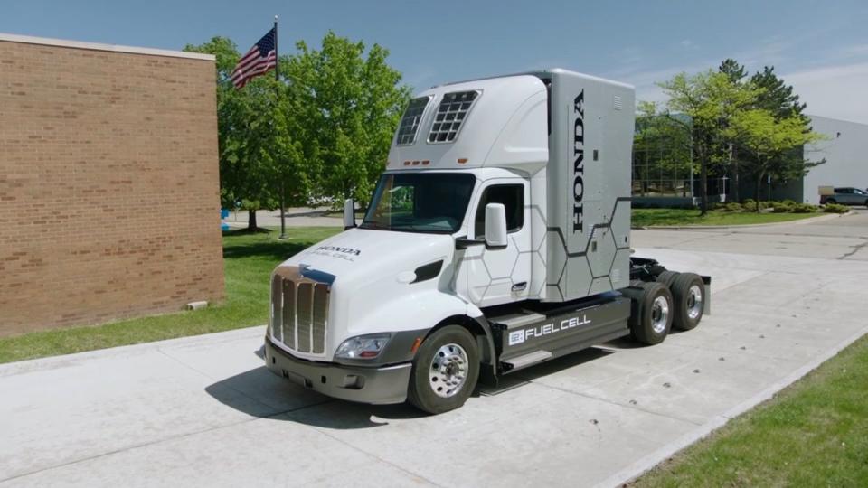 a white truck parked on a driveway