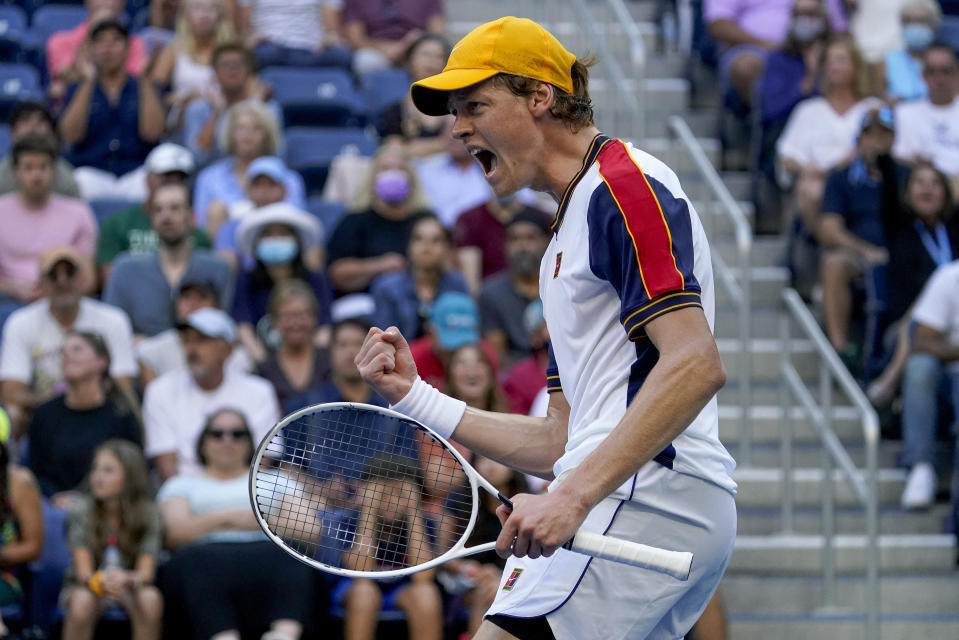 Jannik Sinner, of Italy, reacts after scoring a point against Gael Monfils, of France, during the third round of the US Open tennis championships, Saturday, Sept. 4, 2021, in New York. (AP Photo/Seth Wenig)