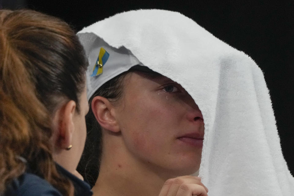 Poland's Iga Swiatek reacts following her loss to United States' Jessica Pegula in their semifinal match at the United Cup tennis event in Sydney, Australia, Friday, Jan. 6, 2023. (AP Photo/Mark Baker)