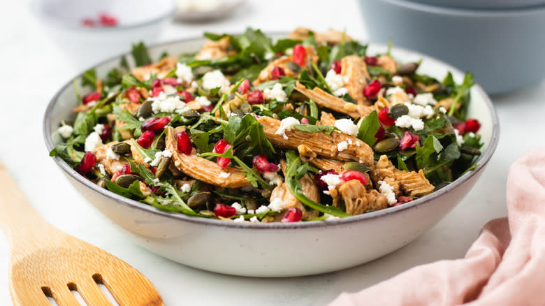 Pomegranate chicken salad in a bowl