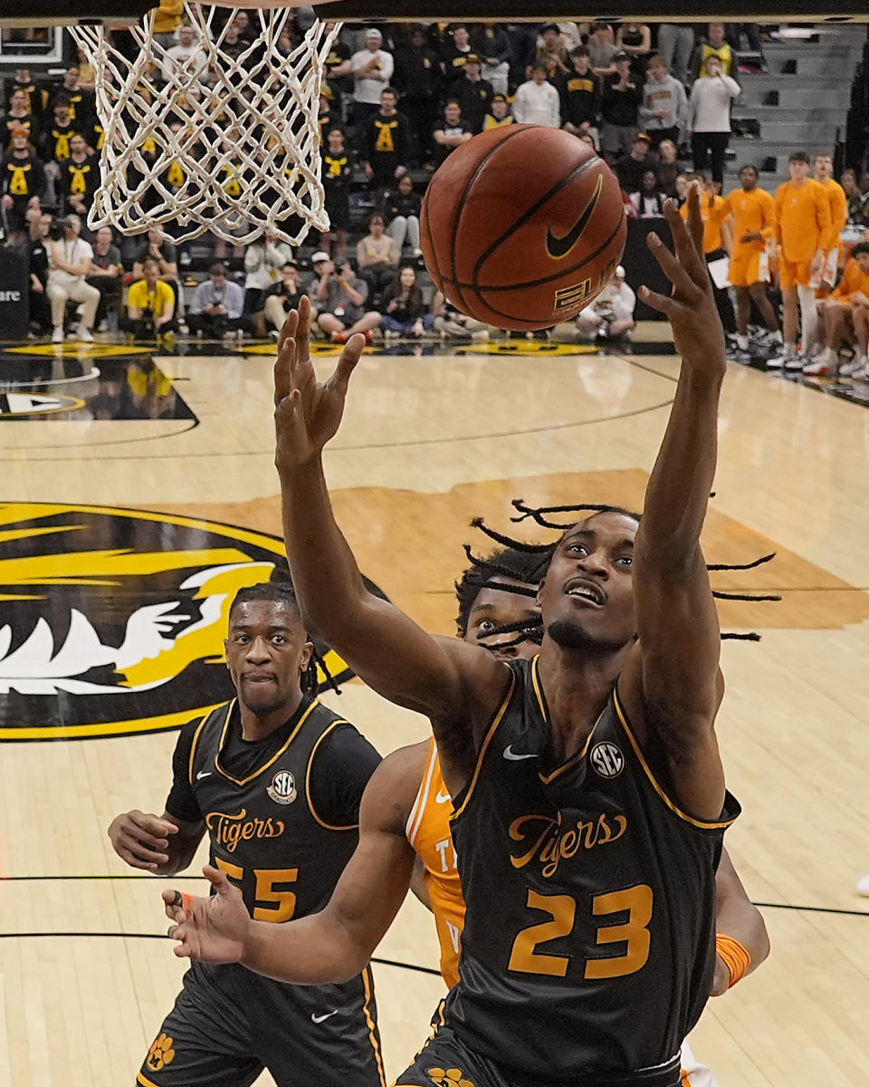 Missouri forward Aidan Shaw (23) grabs a rebound during the first half of an NCAA college basketball game against Tennessee Tuesday, Feb. 20, 2024, in Columbia, Mo. (AP Photo/Charlie Riedel)