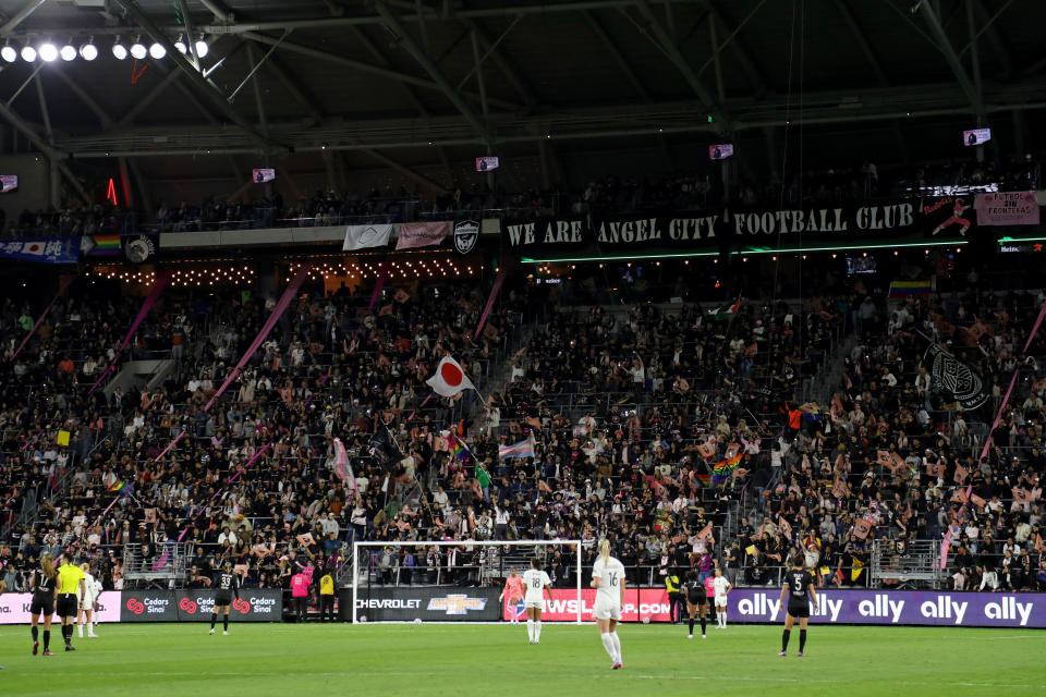 Mar 26, 2023; Los Angeles, California, USA; Angel City FC forward Jun Endo (18) fans wave a Japanese flag during the second half of the game against New Jersey/New York Gotham FC at BMO Stadium. Mandatory Credit: Kiyoshi Mio-USA TODAY Sports