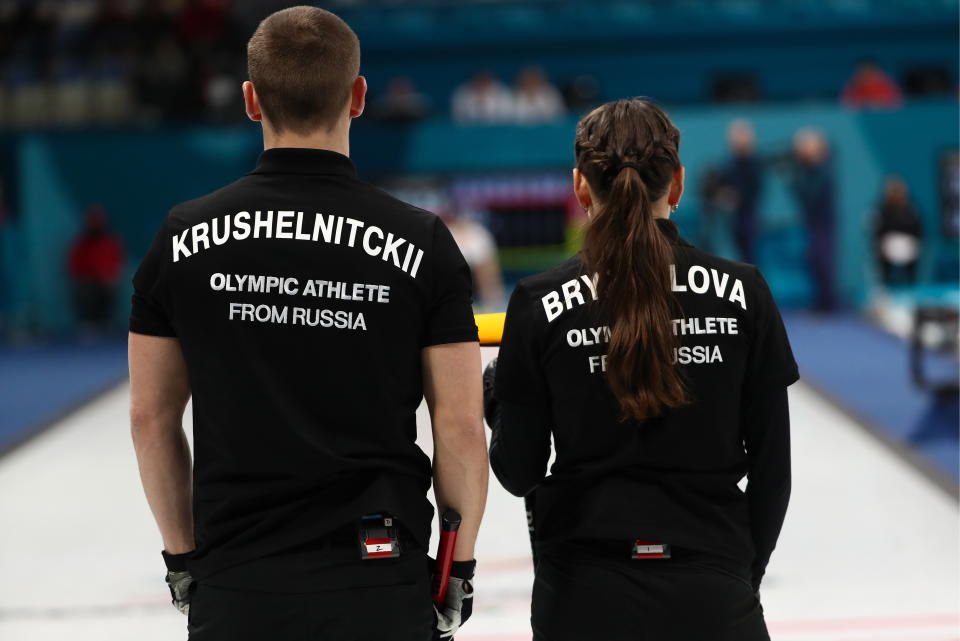 Olympic Athletes from Russia Anastasia Bryzgalova (R) and Alexander Krushelnitsky seen during Session 3 of the Mixed Doubles Round Robin curling competition against Finland at the 2018 Winter Olympic Games at Gangneung Curling Centre.