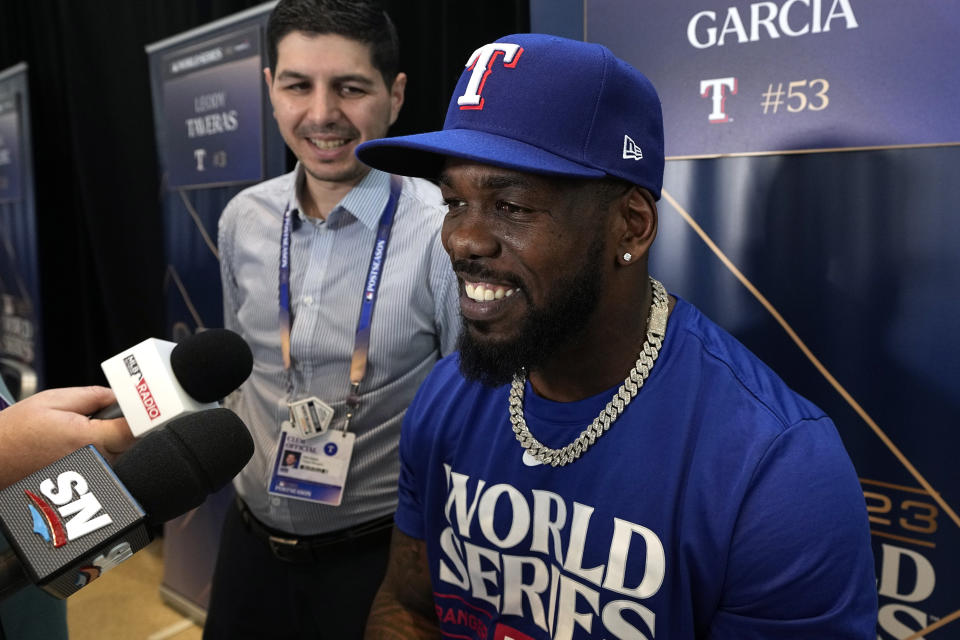 Texas Rangers right fielder Adolis Garcia answers a question during a World Series baseball media day Thursday, Oct. 26, 2023, in Arlington, Texas. The Rangers will play the Arizona Diamondbacks in Game 1 of the World Series tomorrow. (AP Photo/Tony Gutierrez)