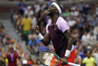 Frances Tiafoe, of the United States, celebrates after winning a point against Rafael Nadal, of Spain, during the fourth round of the U.S. Open tennis championships, Monday, Sept. 5, 2022, in New York. (AP Photo/Julia Nikhinson)