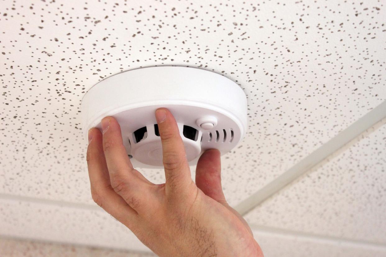 The Direct Connect 911 Smoke Detector alerts a central station whenever smoke is detected. The station in turn calls the fire department and notifies additional contacts by phone or email. A manual shut-off button lets owners alert the emergency operators to a false alarm.