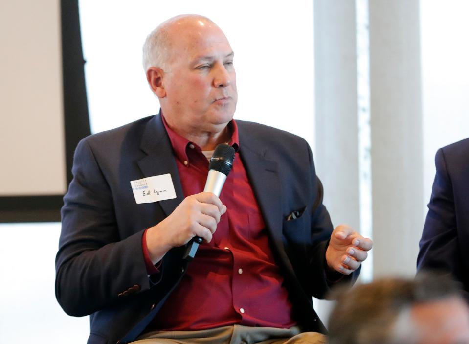 Ed Lynn, owner of a Buffalo Wild Wings on Northwest Expressway, speaks during an Oklahoma City Chamber Forum on the economic impact of a new Oklahoma City Arena.