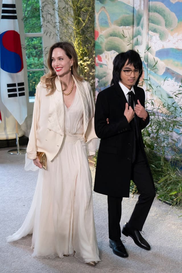 Angelina Jolie and Maddox Jolie-Pitt arrive for a dinner hosted by United States President Joe Biden,and first lady Dr. Jill Biden in honor of President Yoon Suk Yeol of the Republic of Korea and Mrs. Kim Keon Hee, First Lady of the Republic of Korea during a State Visit at the White House in Washington, DC, April 26, 2023.