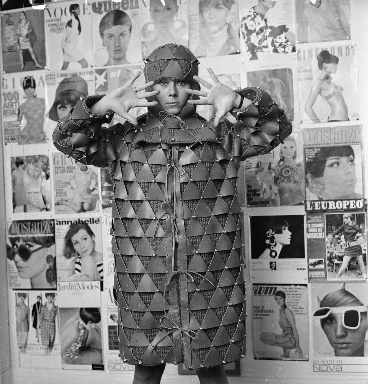 A French model wearing a knitted coat with leather patches designed by Paco Rabanne (Getty Images)