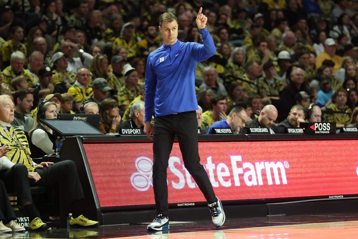 Duke coach Jon Scheyer reacts to a play during his team's game against Wake Forest at Lawrence Joel Veterans Memorial Coliseum.