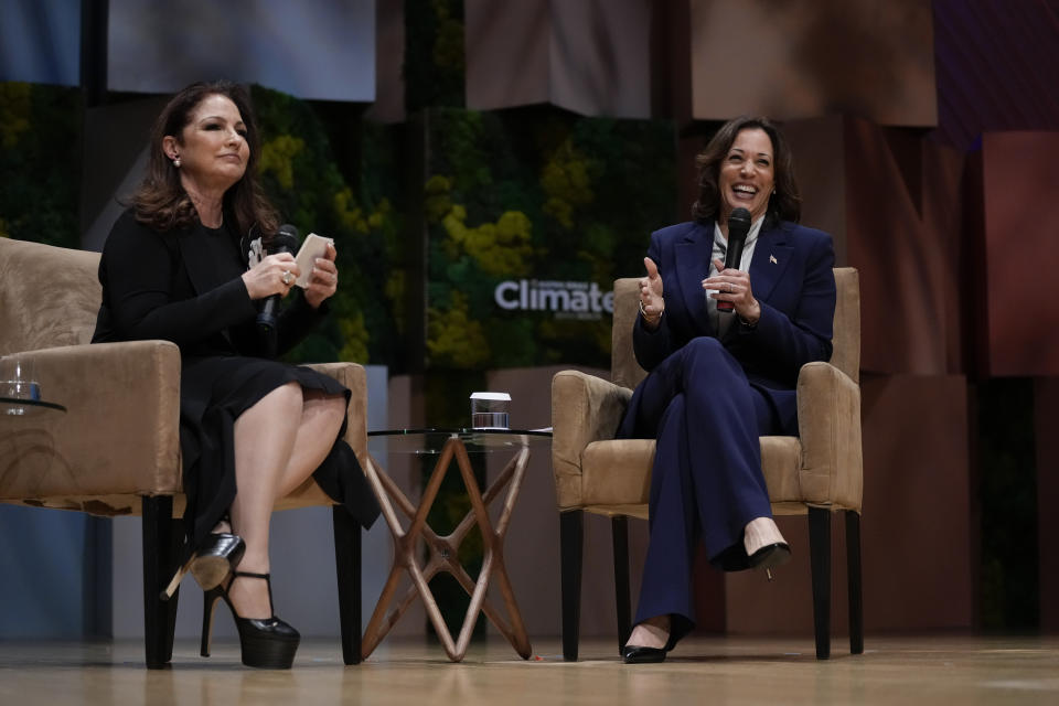 Vice President Kamala Harris, right, speaks with singer Gloria Estefan at the Aspen Ideas: Climate conference, Wednesday, March 8, 2023, in Miami Beach, Fla. The conference is co-hosted by the Aspen Institute and the City of Miami Beach. (AP Photo/Rebecca Blackwell)