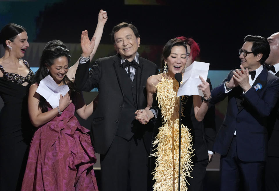 Jenny Slate, from left, Stephanie Hsu, James Hong, Michelle Yeoh, and Ke Huy Quan accept the award for outstanding performance by a cast in a motion picture for "Everything Everywhere All at Once" at the 29th annual Screen Actors Guild Awards on Sunday, Feb. 26, 2023, at the Fairmont Century Plaza in Los Angeles. (AP Photo/Chris Pizzello)
