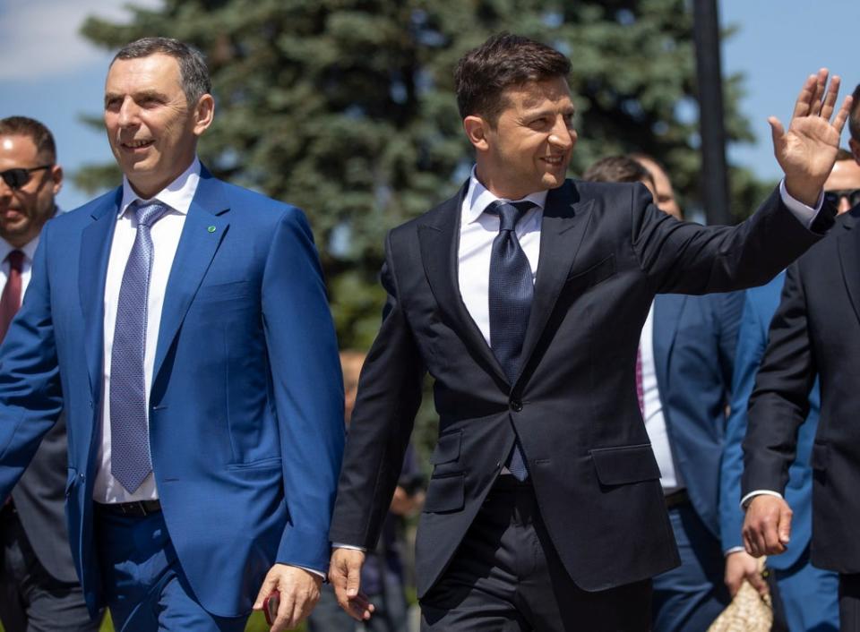 Serhiy Shefir (left) with Ukrainian president Volodymyr Zelensky during his inauguration (EPA)