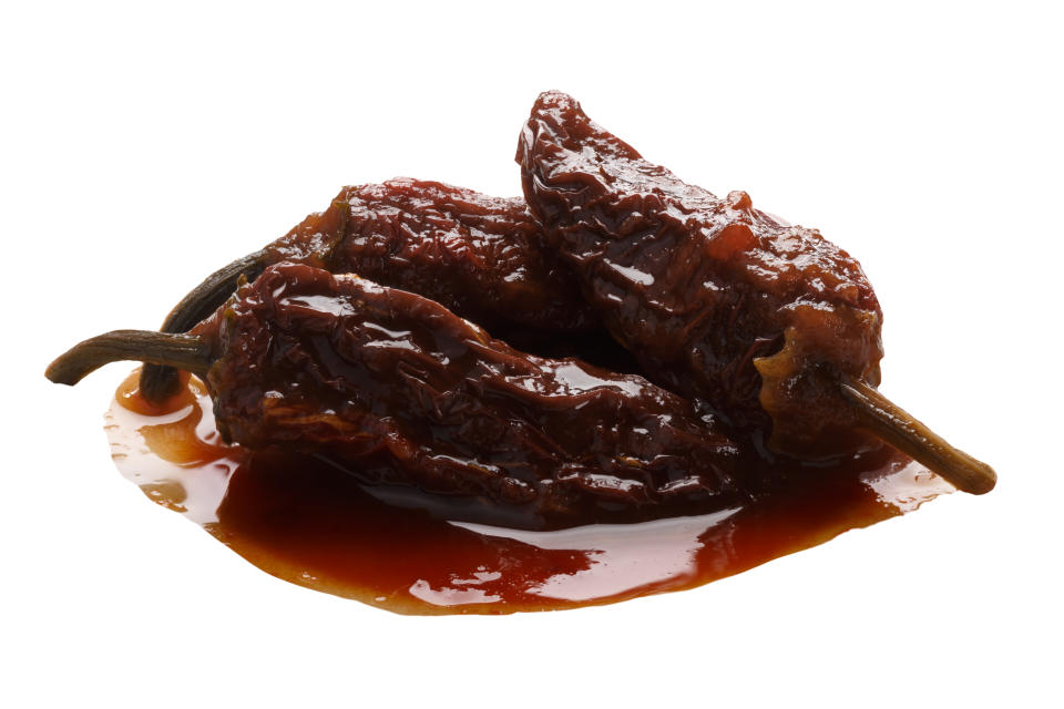 Chipotles in adobo are whole smoke-dried jalapeno peppers in seasoning. (Photo: maxsol7 via Getty Images)