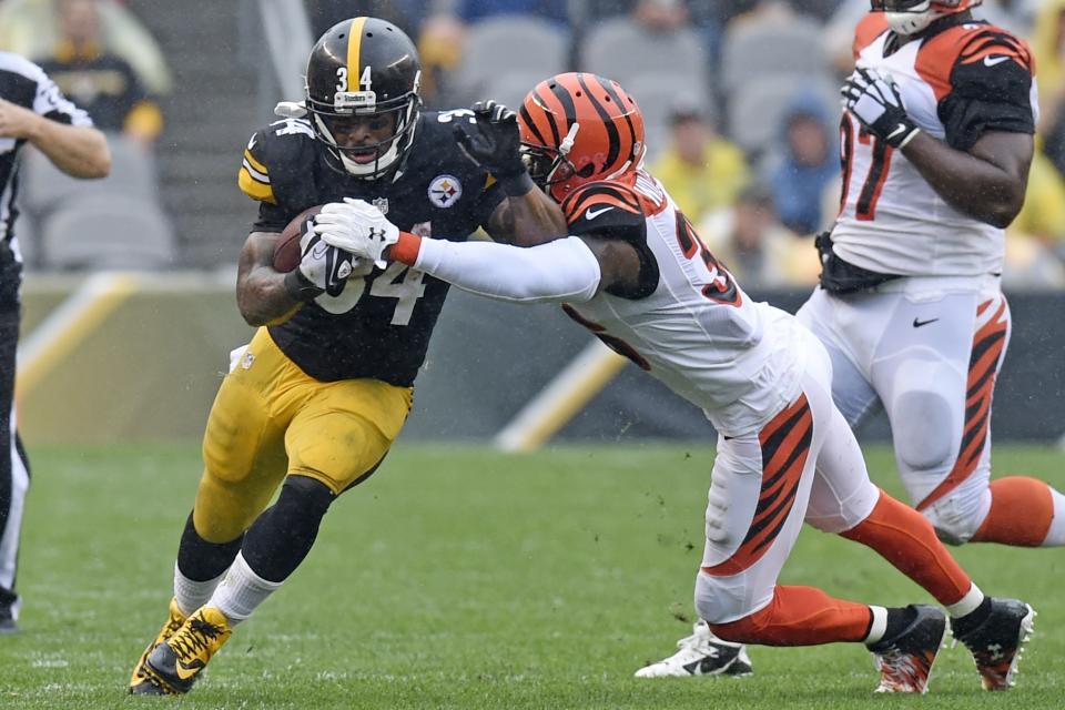 <p>Pittsburgh Steelers running back DeAngelo Williams (34) is tackled by Cincinnati Bengals strong safety Shawn Williams (36) during the first half of an NFL football game in Pittsburgh, Sunday, Sept. 18, 2016. (AP Photo/Don Wright) </p>