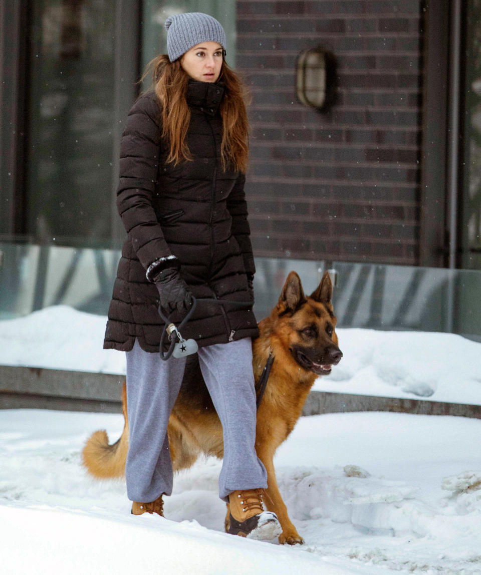 <p>Shailene Woodley and her pup are bundled up as they walk through Montreal, Canada, on Friday.</p>