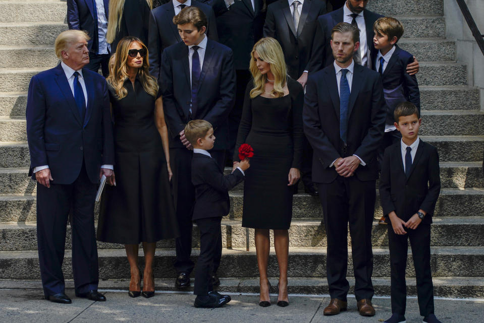 Former President Donald Trump, far left, and Melania Trump stand outside St. Vincent Ferrer Roman Catholic Church with family members Barron Trump, Ivanka Trump and Eric Trump, after the funeral for Ivana Trump, Wednesday, July 20, 2022, in New York. / Credit: Julia Nikhinson / AP